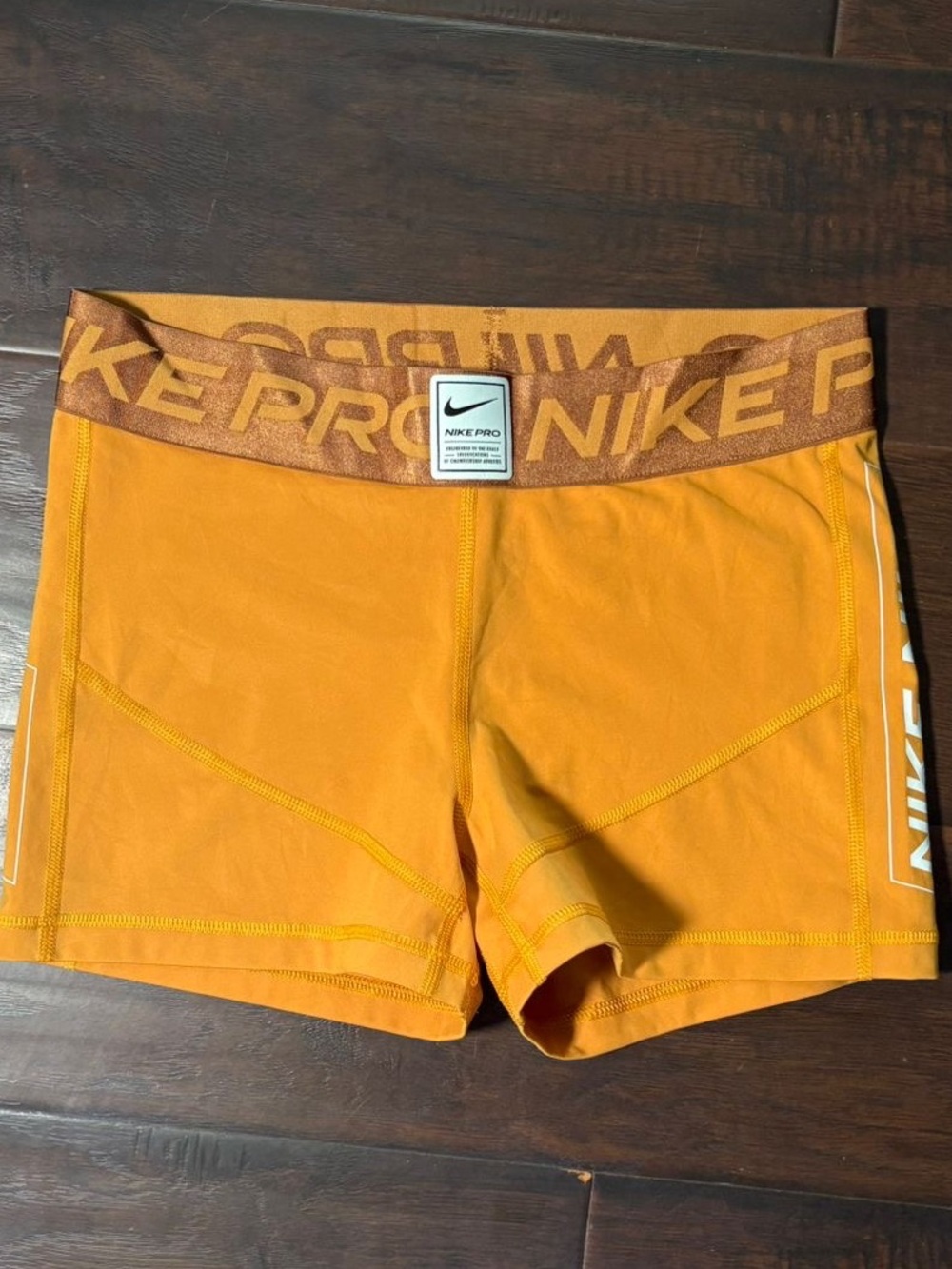 Nike Women’s Bike Shorts in Bright Orange with Logo Waistband